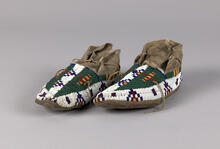 Beaded leather moccasins with geometric designs